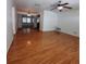 Spacious living room with laminate wood flooring and a ceiling fan at 10011 40Th N St # 3, Pinellas Park, FL 33782