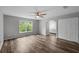 Main bedroom with large window and ensuite bathroom access at 2220 Linda Ln, Lutz, FL 33558