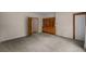 Bright bedroom featuring wood cabinet and carpet flooring at 2220 Linda Ln, Lutz, FL 33558