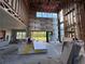 Interior framing and drywall installation in progress, showing large windows at 8100 Spring Forest Ln, Wesley Chapel, FL 33544