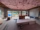 Unfinished garage interior with high ceilings and open views at 8100 Spring Forest Ln, Wesley Chapel, FL 33544