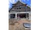 Exterior view of a house under construction, showing blockwork and scaffolding at 8100 Spring Forest Ln, Wesley Chapel, FL 33544