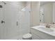 Bathroom featuring a glass enclosed shower and quartz counters at 12977 Long Valley Cir, Spring Hill, FL 34609