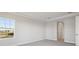Bedroom with a large window, neutral walls, and carpet at 12977 Long Valley Cir, Spring Hill, FL 34609