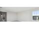 Bright bedroom with neutral walls and carpeting, ample natural light from a large window at 3437 Yellow Leaf Cir, Spring Hill, FL 34609