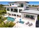Luxury waterfront home with private pool and expansive patio at 490 Laguna Dr, Tierra Verde, FL 33715