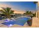 Expansive pool and spa with waterfront views at 490 Laguna Dr, Tierra Verde, FL 33715