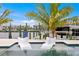 Stunning pool with lounge chairs and waterfront view at 490 Laguna Dr, Tierra Verde, FL 33715