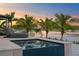 Relaxing spa with water feature and sunset view at 490 Laguna Dr, Tierra Verde, FL 33715