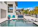 Relaxing pool area with comfortable seating and a tranquil atmosphere at 490 Laguna Dr, Tierra Verde, FL 33715