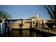 Luxury yacht docked at night, offering serene waterfront views at 490 Laguna Dr, Tierra Verde, FL 33715