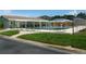 Relaxing community pool with lounge chairs and a fenced area at 34045 Brown Bayou, Wesley Chapel, FL 33543