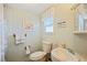 Clean bathroom with a toilet, sink, and shower/tub combo at 34045 Brown Bayou, Wesley Chapel, FL 33543