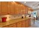 Bright kitchen with granite countertops and ample wood cabinetry at 4103 24Th W Ave, Bradenton, FL 34205