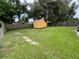 Large backyard with a shed and ample green space at 1515 E 32Nd Ave, Tampa, FL 33610