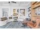 Living area with sectional sofa, coffee table, and stylish artwork at 490 Laguna Dr, Tierra Verde, FL 33715