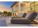 Comfortable lounge chairs on the patio, overlooking the water at 490 Laguna Dr, Tierra Verde, FL 33715