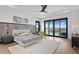 Spacious main bedroom with water views and private balcony at 490 Laguna Dr, Tierra Verde, FL 33715