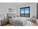 Bright bedroom with a comfortable bed and water views at 490 Laguna Dr, Tierra Verde, FL 33715