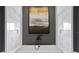 Spa-like bathroom with soaking tub and marble tile at 490 Laguna Dr, Tierra Verde, FL 33715
