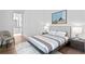 Spacious bedroom with wood floors and an en-suite bathroom at 490 Laguna Dr, Tierra Verde, FL 33715