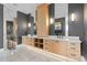 Modern bathroom with double vanity and marble floors at 490 Laguna Dr, Tierra Verde, FL 33715