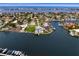 Wide shot of the property and surrounding waterfront community at 490 Laguna Dr, Tierra Verde, FL 33715
