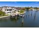 Luxury waterfront home with private boat dock and swimming pool at 490 Laguna Dr, Tierra Verde, FL 33715