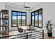 Spacious office with large windows offering scenic water views at 490 Laguna Dr, Tierra Verde, FL 33715