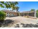 Expansive backyard featuring a large patio area and screened-in lanai, perfect for outdoor living and entertaining at 1105 Deer Run Pl, Valrico, FL 33594