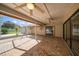 Relaxing screened patio with brick pavers and ceiling fans at 1105 Deer Run Pl, Valrico, FL 33594