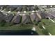 Aerial view showcases backyard pond at 6342 Kenava Loop, Palmetto, FL 34221