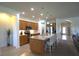 Beautiful kitchen with an island and breakfast bar, granite countertops, and modern appliances at 6342 Kenava Loop, Palmetto, FL 34221