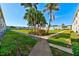 Community with lush landscaping and walkways at 8100 Dr Martin Luther King Jr N St # 208, St Petersburg, FL 33702
