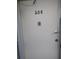 Unit 208 entrance with doorbell and lock at 8100 Dr Martin Luther King Jr N St # 208, St Petersburg, FL 33702
