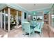 Dining room with glass doors leading to a patio at 6342 Kenava Loop, Palmetto, FL 34221