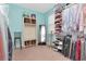 Large walk-in closet with shelving and plenty of storage space at 6342 Kenava Loop, Palmetto, FL 34221