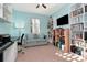 Spacious home office with built-in shelving and comfortable seating at 6342 Kenava Loop, Palmetto, FL 34221