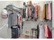 Walk-in closet with ample shelving and hanging space at 6342 Kenava Loop, Palmetto, FL 34221