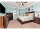 Spacious bedroom with a king-size bed and plenty of natural light at 6342 Kenava Loop, Palmetto, FL 34221