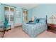 Comfortable bedroom with a queen-size bed and plenty of natural light at 6342 Kenava Loop, Palmetto, FL 34221