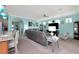 Bright living room with neutral color palette and comfortable seating at 6342 Kenava Loop, Palmetto, FL 34221