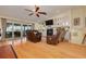 Relaxing living room with fireplace and hardwood floors at 2202 Donato Dr, Belleair Beach, FL 33786