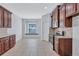 Modern kitchen with granite countertops and stainless steel appliances at 7806 Grasmere Dr, Land O Lakes, FL 34637