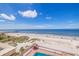 Stunning ocean view from condo balcony with beach and pier at 18610 Gulf Blvd # 402, Indian Shores, FL 33785