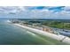 Aerial view showcasing beachfront location and waterway at 18610 Gulf Blvd # 402, Indian Shores, FL 33785