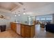 Kitchen with ocean view, granite counters, and island seating at 18610 Gulf Blvd # 402, Indian Shores, FL 33785
