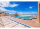 Refreshing community pool with ample lounge chairs at 18610 Gulf Blvd # 402, Indian Shores, FL 33785