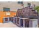 Community grills with stone accents and seating at 18610 Gulf Blvd # 402, Indian Shores, FL 33785