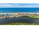 Aerial view showing building location near ocean and river at 18610 Gulf Blvd # 402, Indian Shores, FL 33785